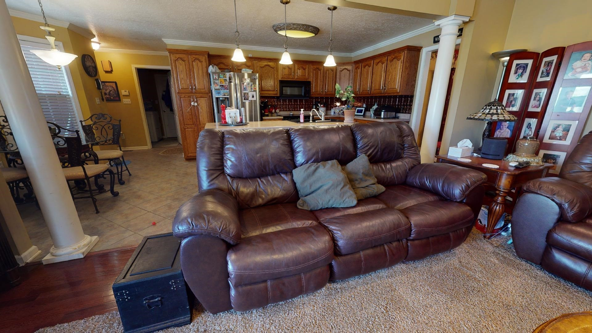50 Bobby Thompson Road Newbern, TN 38059 - Photo 5 of 26 a living room with furniture and a bookshelf