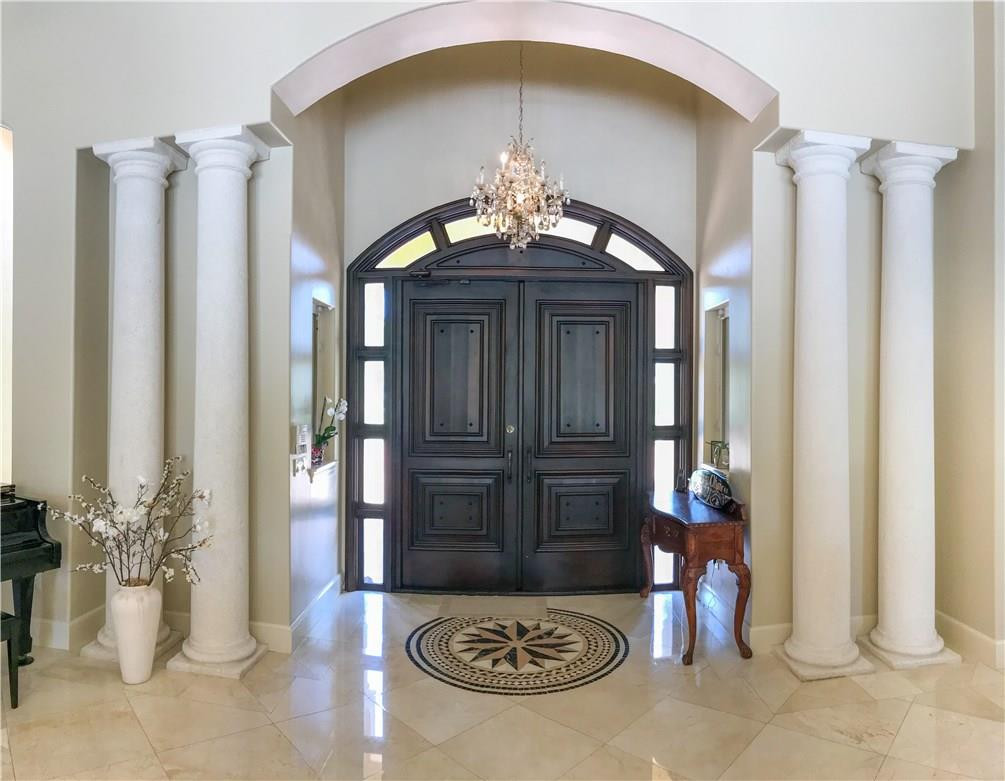 5571 Southwest 145th Avenue Southwest Ranches, FL 33330 - Photo 11 of 40 FOYER ENTRY W/SOLID WOOD DOORS