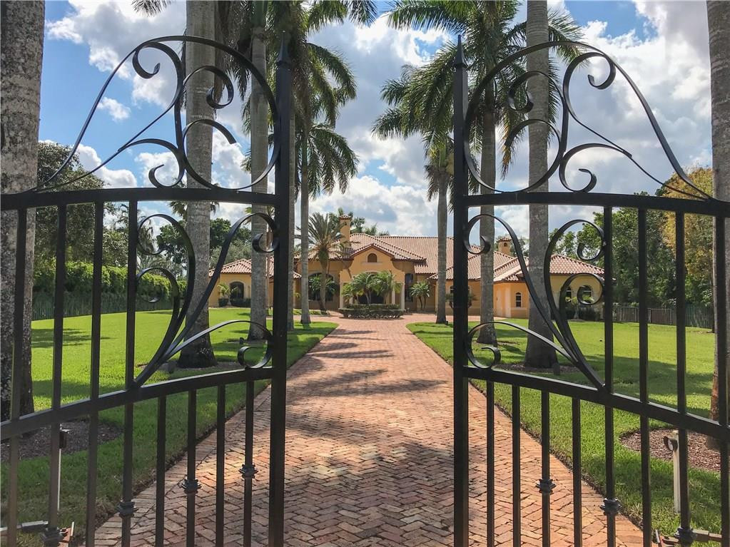 5571 Southwest 145th Avenue Southwest Ranches, FL 33330 - Photo 3 of 40 GATED FRONT ENTRANCE