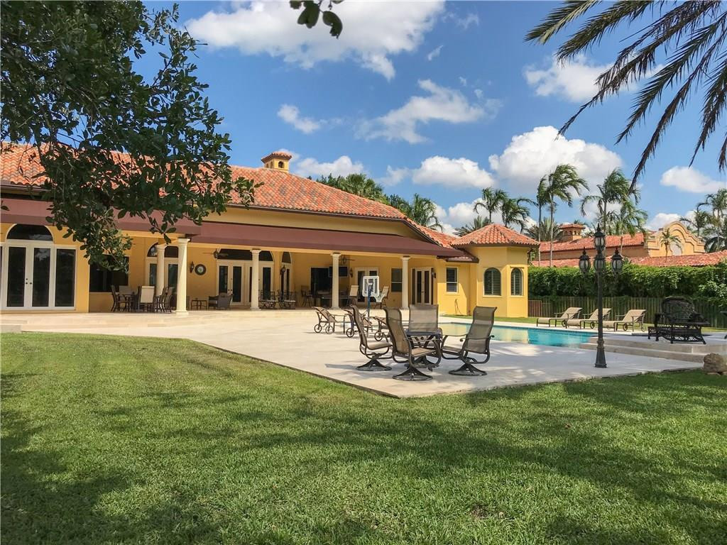 5571 Southwest 145th Avenue Southwest Ranches, FL 33330 - Photo 7 of 40 REAR OF SUBJECT, PATIO AND POOL AREA