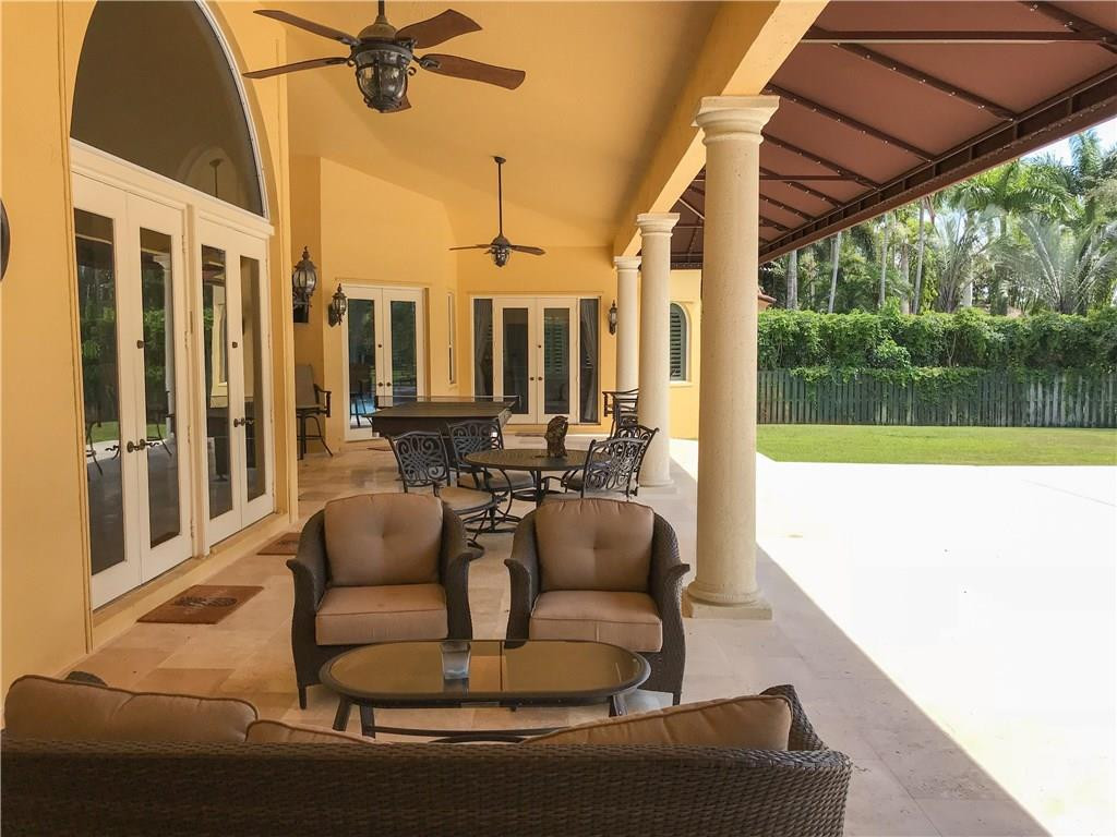 5571 Southwest 145th Avenue Southwest Ranches, FL 33330 - Photo 10 of 40 EXTENDED ROOFED PATIO