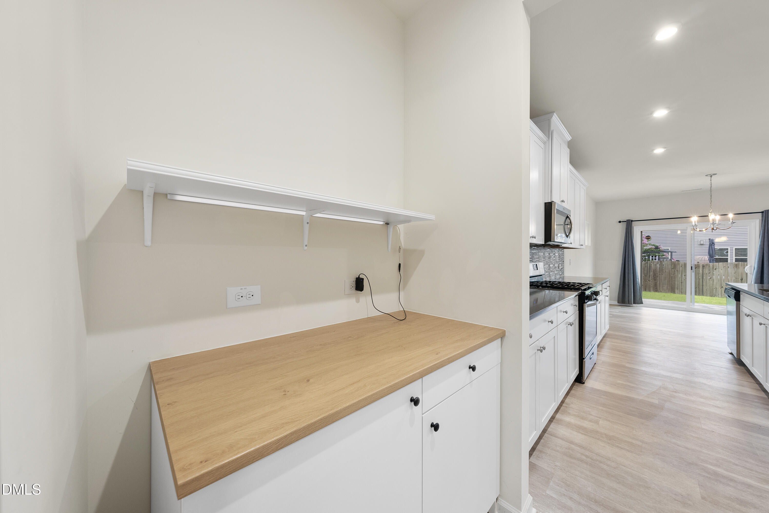 905 Lippincott Road Durham, NC 27703 - Photo 7 of 24 a view of hallway and kitchen