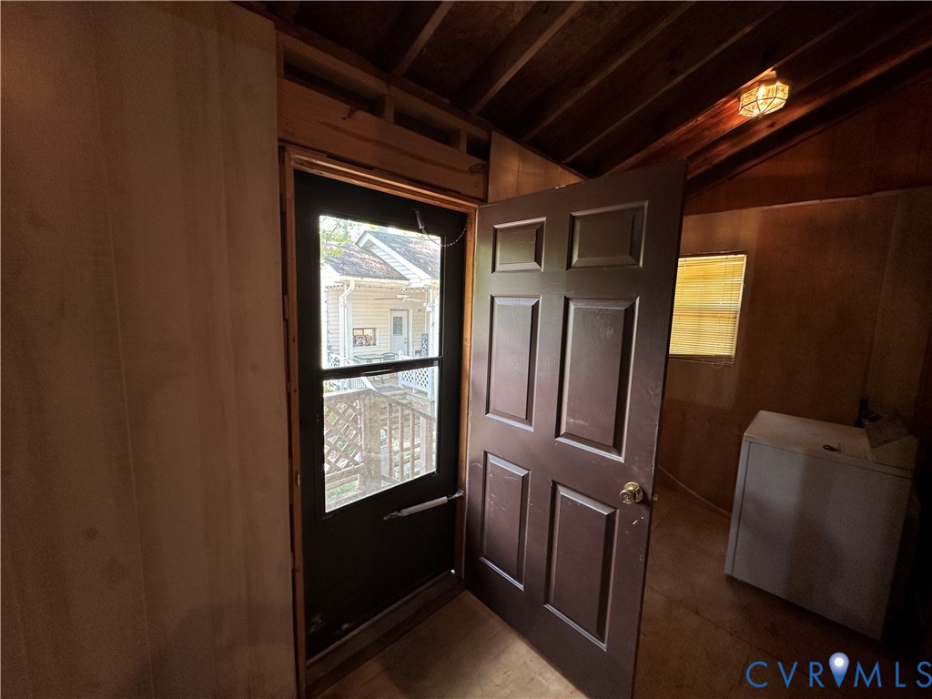 421 Happy Trail Bracey, VA 23919 - Photo 15 of 22 Doorway featuring lofted ceiling