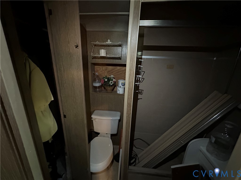 421 Happy Trail Bracey, VA 23919 - Photo 20 of 22 Bathroom with toilet and a stall shower