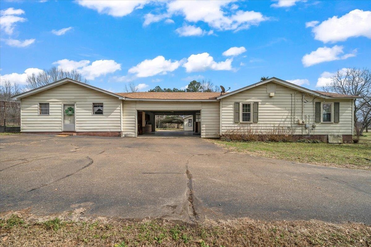 2972 Russell Bond Road Millington, TN 38053 - Photo 12 of 38 a front view of a house with a yard