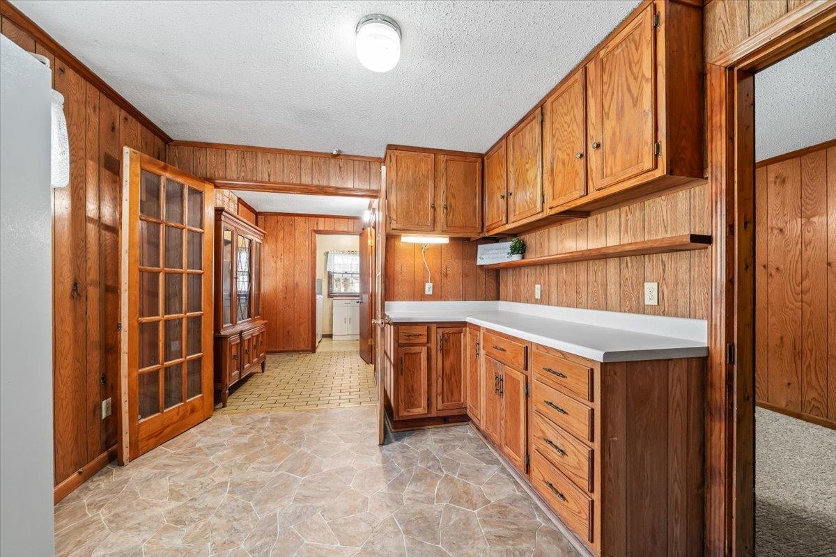 2972 Russell Bond Road Millington, TN 38053 - Photo 31 of 38 a kitchen with stainless steel appliances granite countertop a refrigerator a stove and a sink