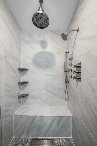 a view of water heater room with stairs