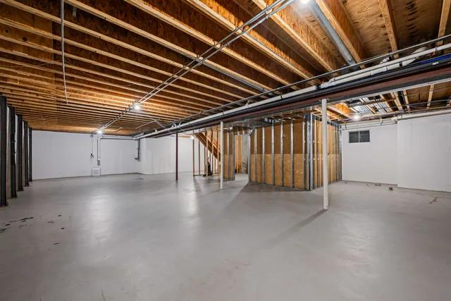 a view of a room with wooden walls