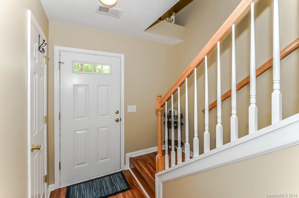 16732 Timber Crossing Road, Unit 2023 Charlotte, NC 28213 - Photo 3 of 21 a view of an entryway with staircase