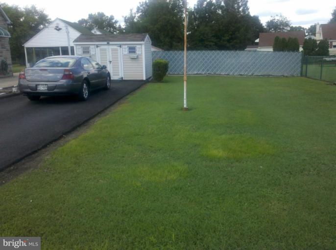 3926 North Point Road Dundalk, MD 21222 - Photo 6 of 23 a view of yard with car parked