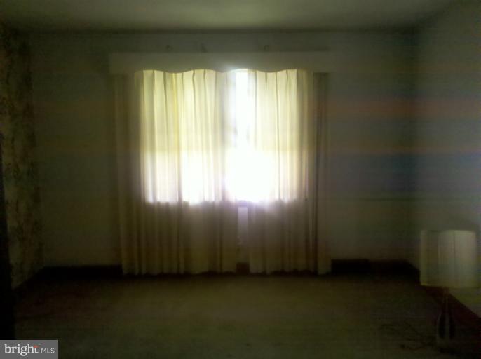 3926 North Point Road Dundalk, MD 21222 - Photo 7 of 23 a view of an empty room and window