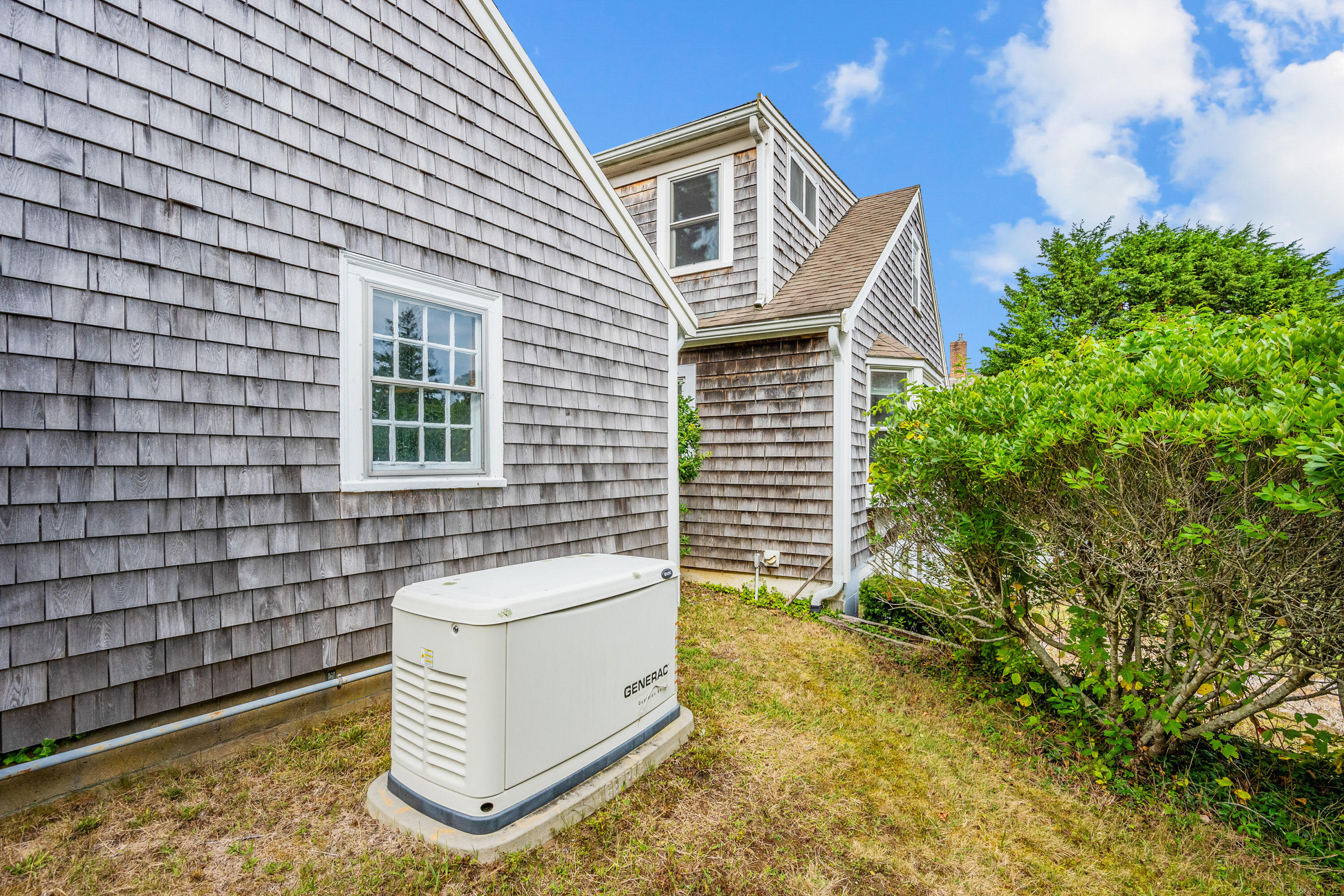 33 Mill Pond Road Orleans, MA 02653 - Photo 11 of 50 a view of house with backyard