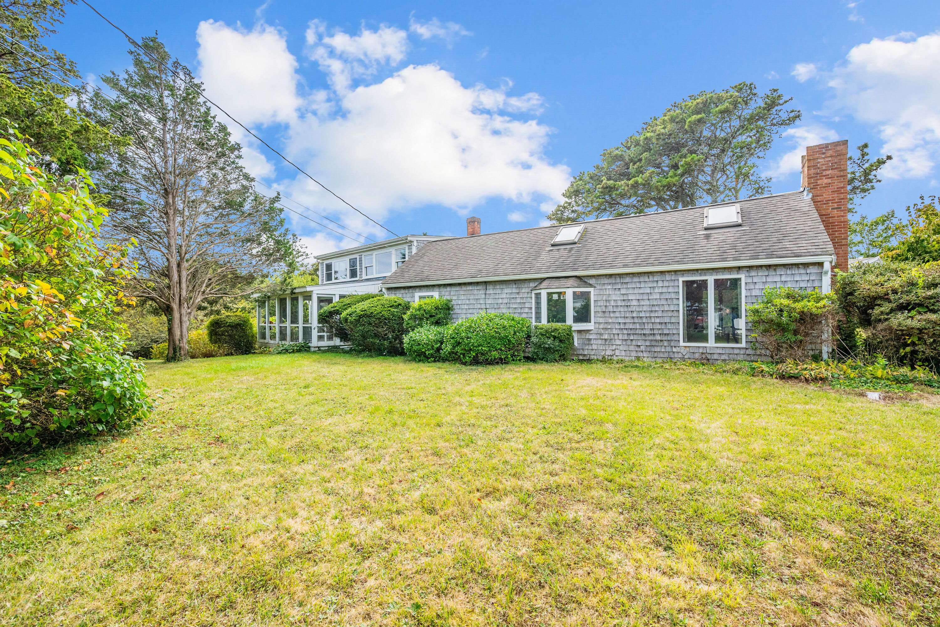 33 Mill Pond Road Orleans, MA 02653 - Photo 18 of 50 a house view with a swimming pool