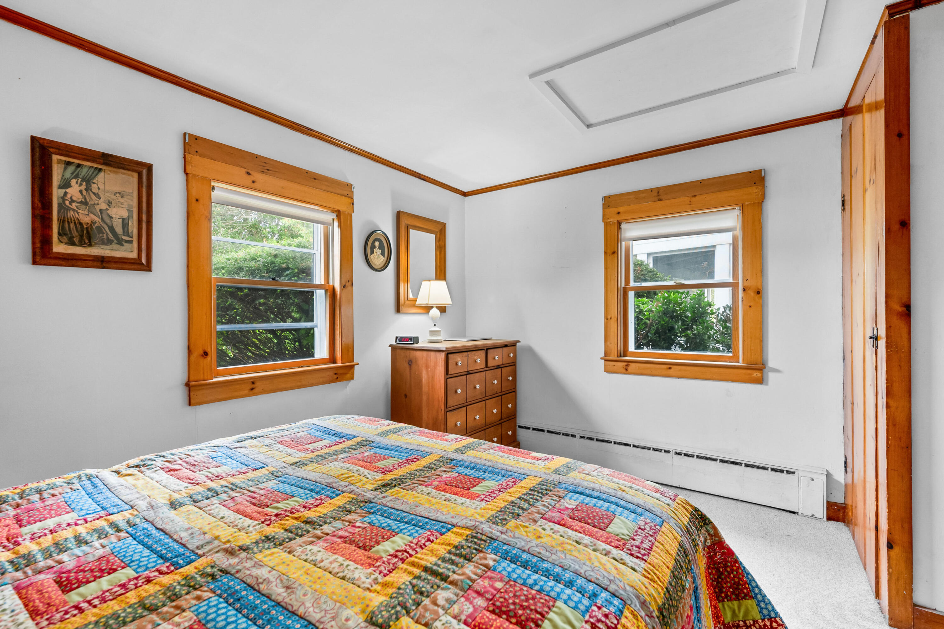 33 Mill Pond Road Orleans, MA 02653 - Photo 27 of 50 a bedroom with a bed and a window