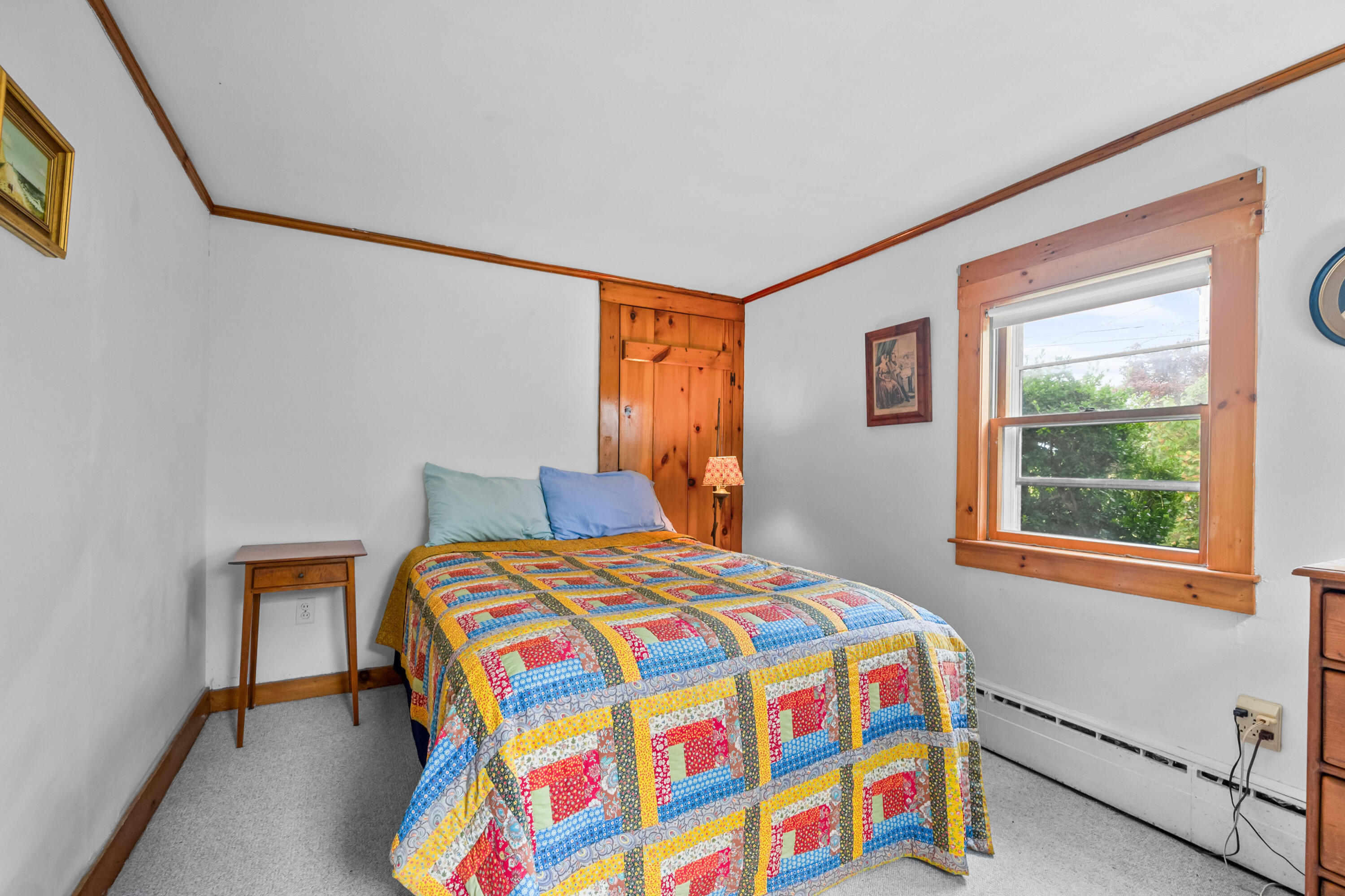 33 Mill Pond Road Orleans, MA 02653 - Photo 28 of 50 a bedroom with a bed and a window