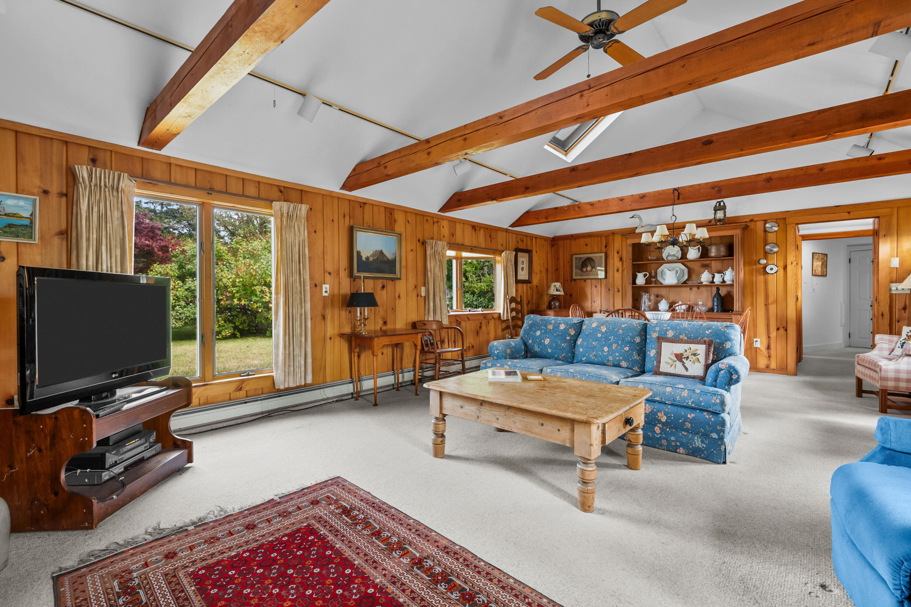 33 Mill Pond Road Orleans, MA 02653 - Photo 33 of 50 a living room with furniture and a flat screen tv
