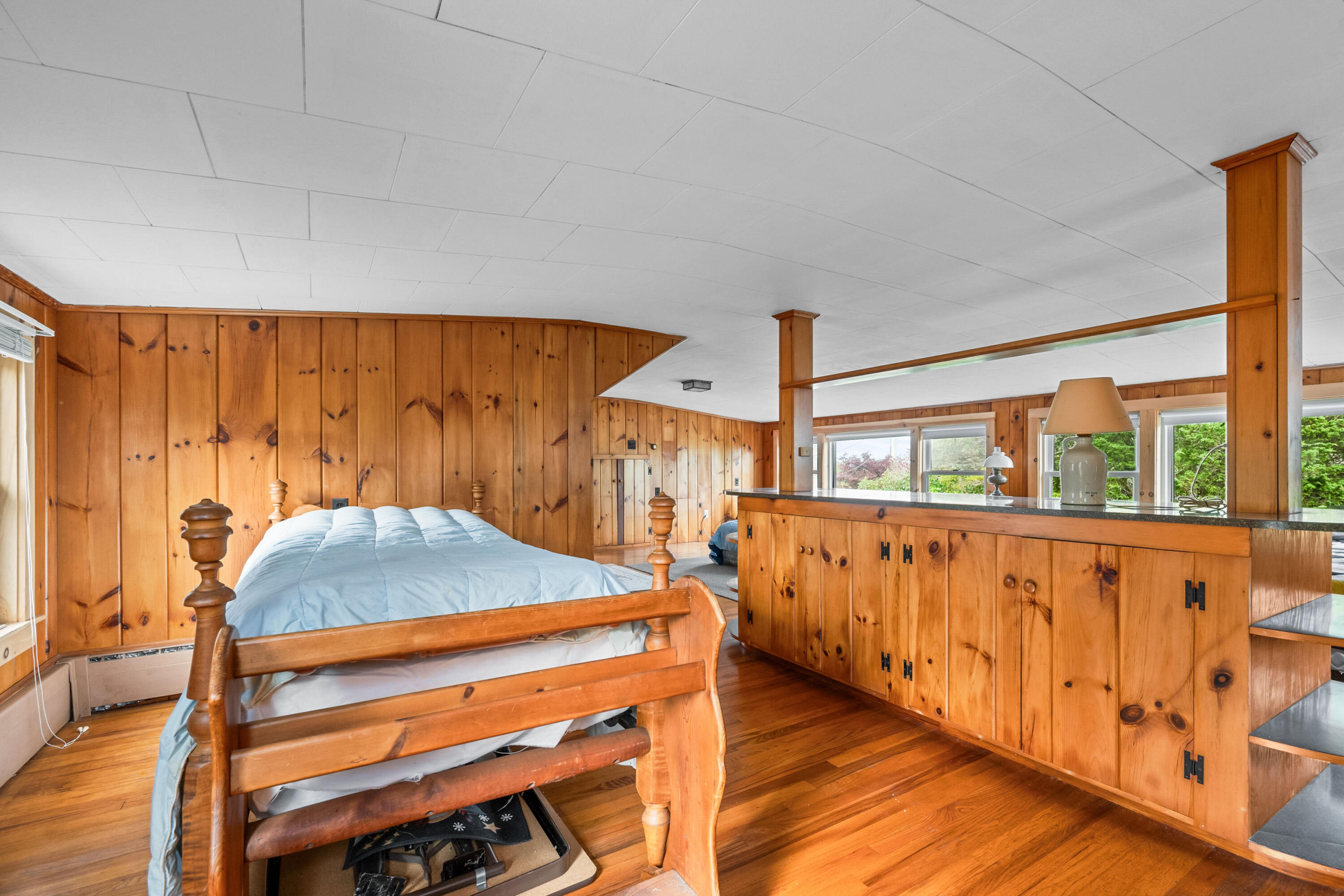 33 Mill Pond Road Orleans, MA 02653 - Photo 38 of 50 a room with wooden floor and windows