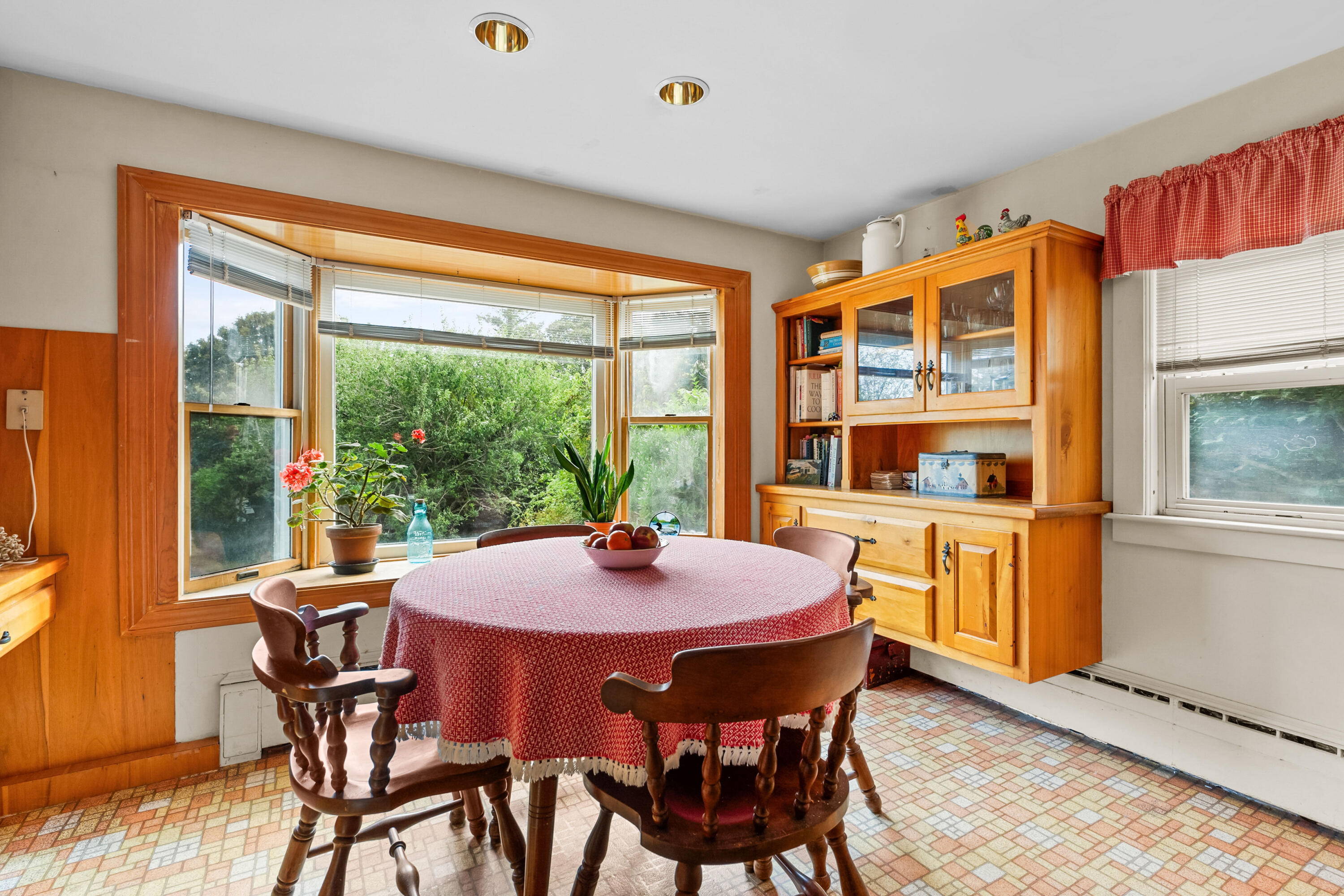 33 Mill Pond Road Orleans, MA 02653 - Photo 4 of 50 a view of a dining room with furniture window and wooden floor