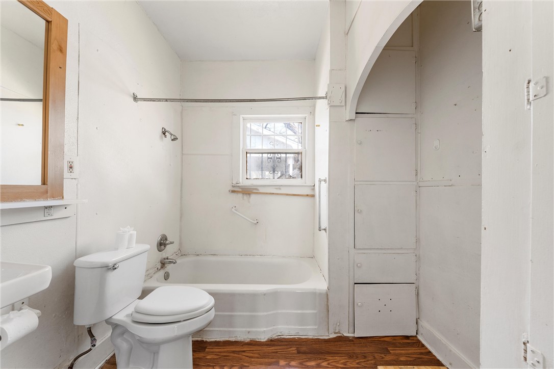 2012 North 5th Street Waco, TX 76708 - Photo 20 of 29 a bathroom with a sink toilet and shower