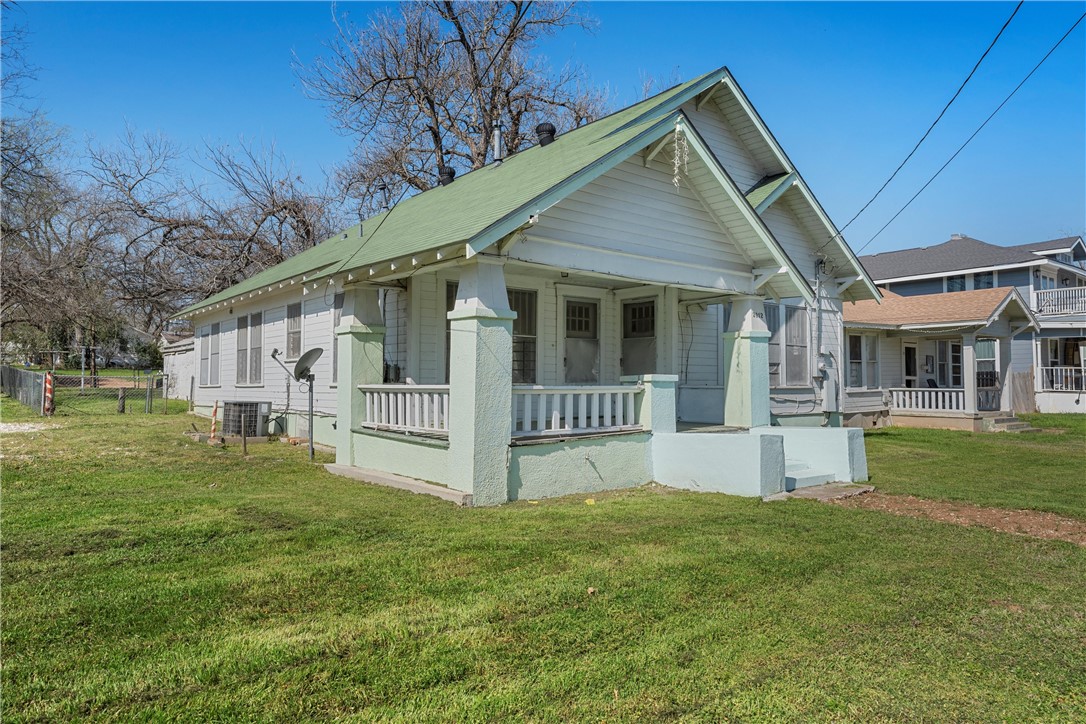2012 North 5th Street Waco, TX 76708 - Photo 2 of 29 a view of a house with a yard and deck