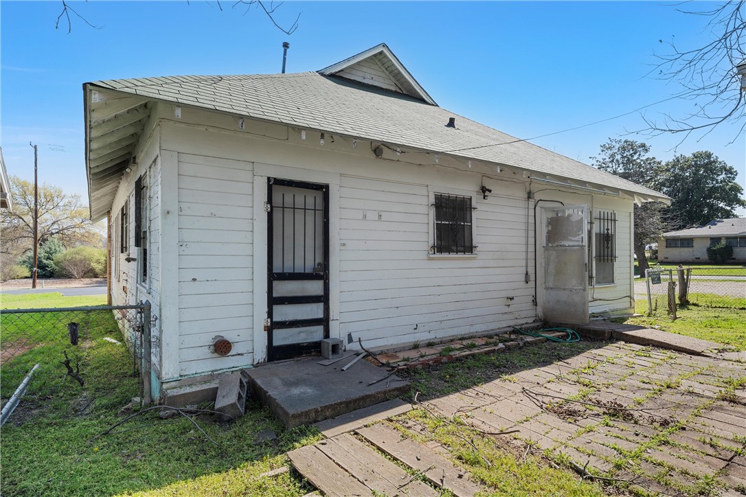 2012 North 5th Street Waco, TX 76708 - Photo 23 of 29 a front view of a house with garden