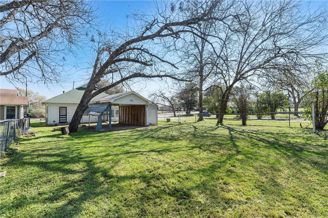 2012 North 5th Street Waco, TX 76708 - Photo 25 of 29 a view of a house with a yard