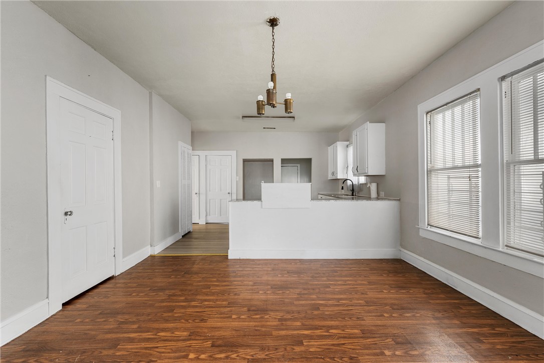2012 North 5th Street Waco, TX 76708 - Photo 7 of 29 a view of a kitchen with a sink cabinet and a window