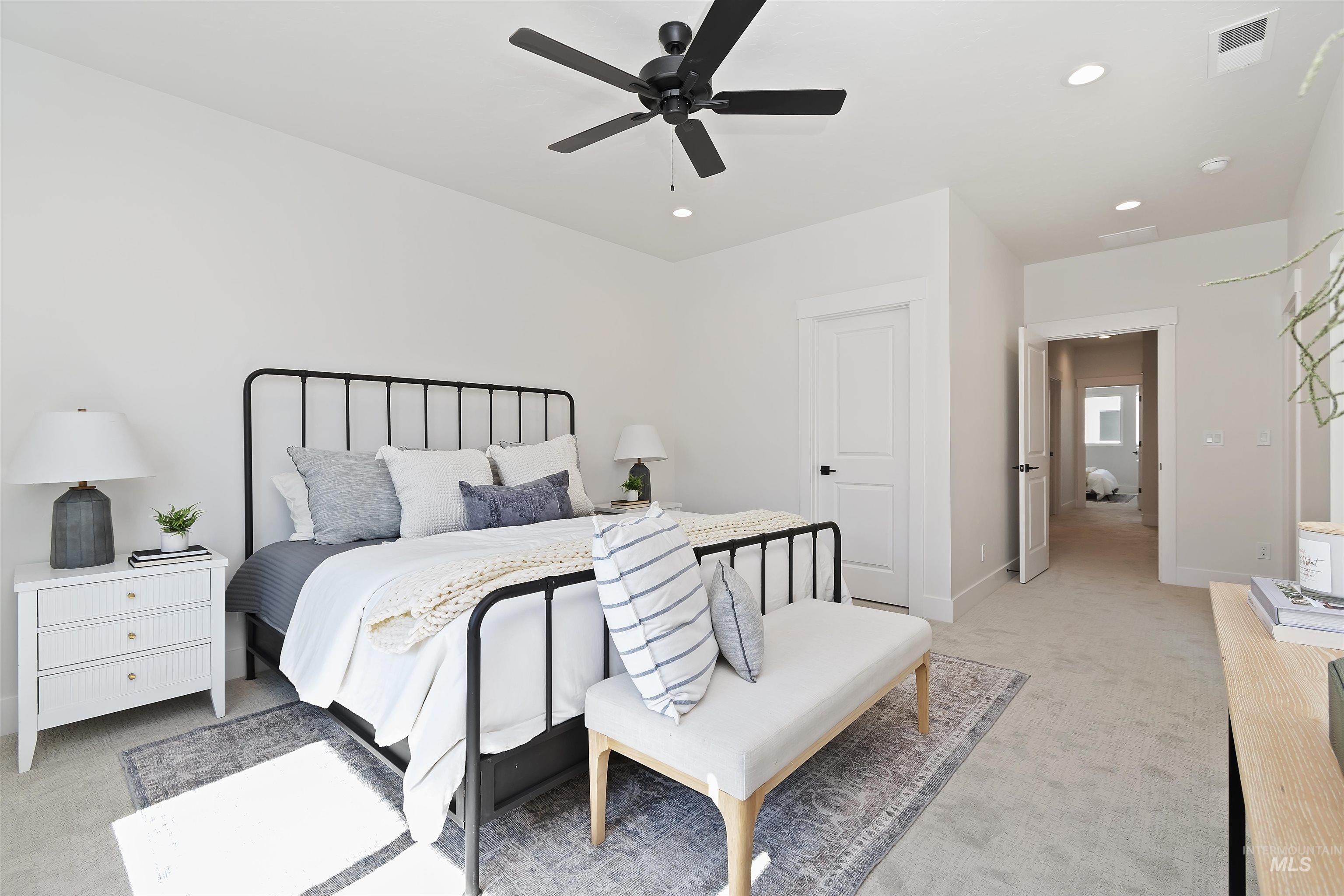724 South Calhoun Lane Star, ID 83669 - Photo 16 of 44 Bedroom featuring light carpet, ceiling fan, and recessed lighting
