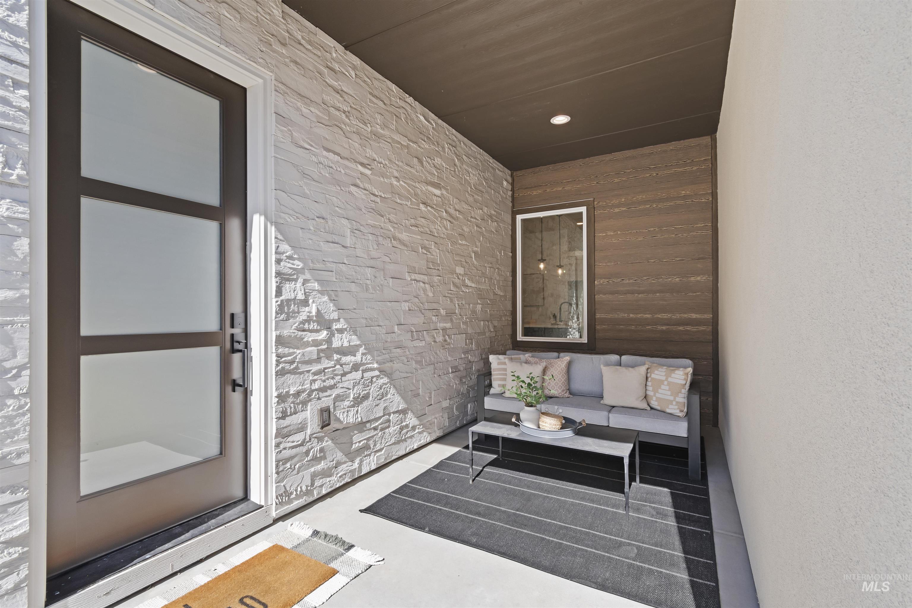 724 South Calhoun Lane Star, ID 83669 - Photo 3 of 44 View of exterior entry featuring stone siding