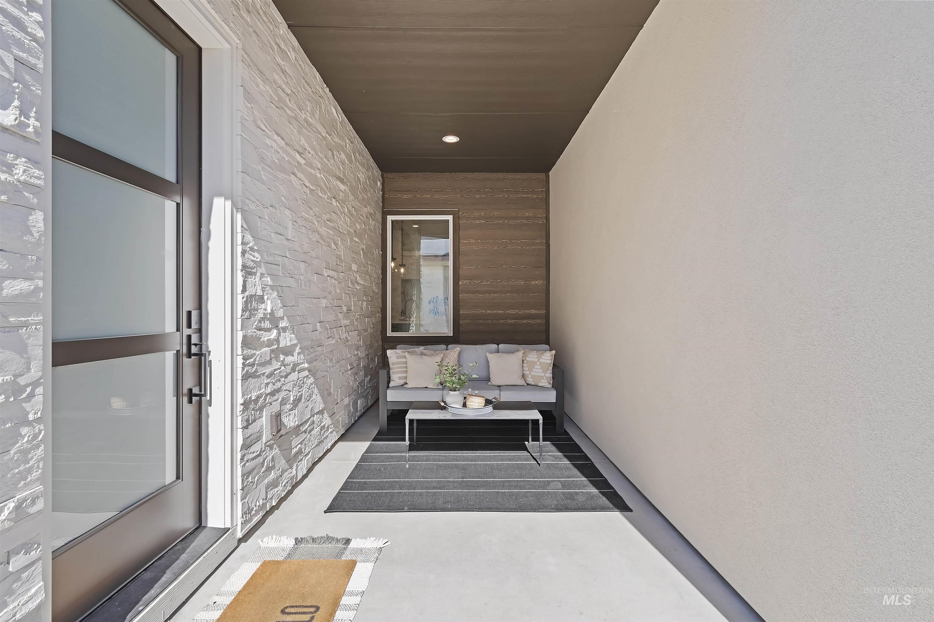 724 South Calhoun Lane Star, ID 83669 - Photo 32 of 44 View of exterior entry featuring stone siding