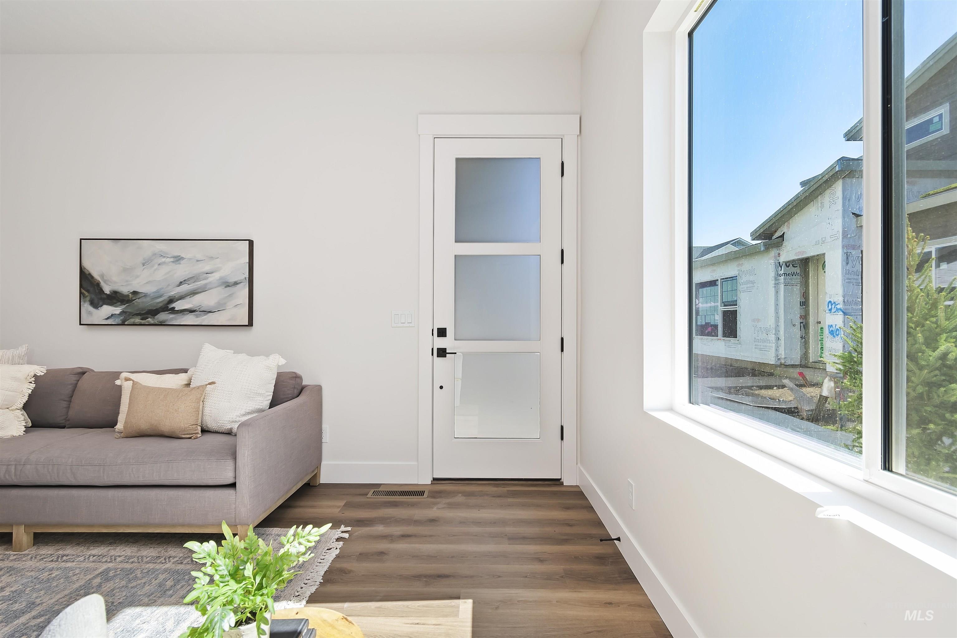 724 South Calhoun Lane Star, ID 83669 - Photo 33 of 44 Foyer with wood finished floors and baseboards