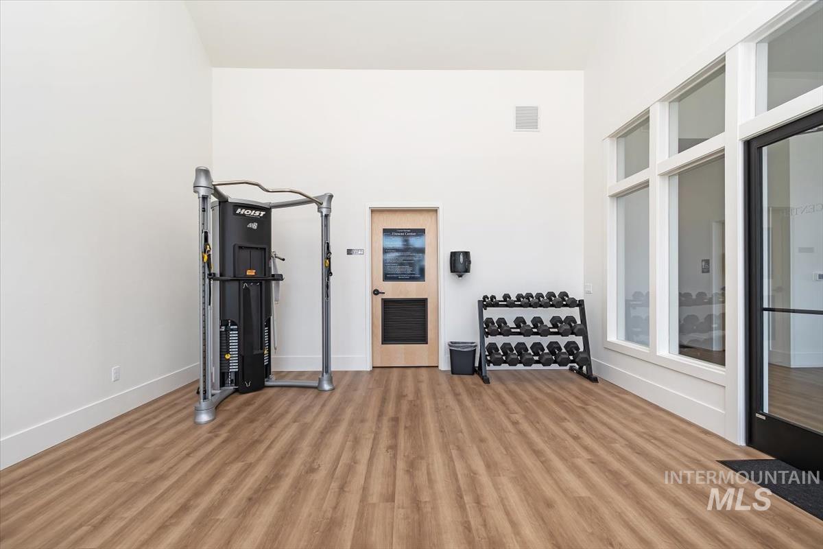 724 South Calhoun Lane Star, ID 83669 - Photo 39 of 44 Workout area with wood finished floors and baseboards