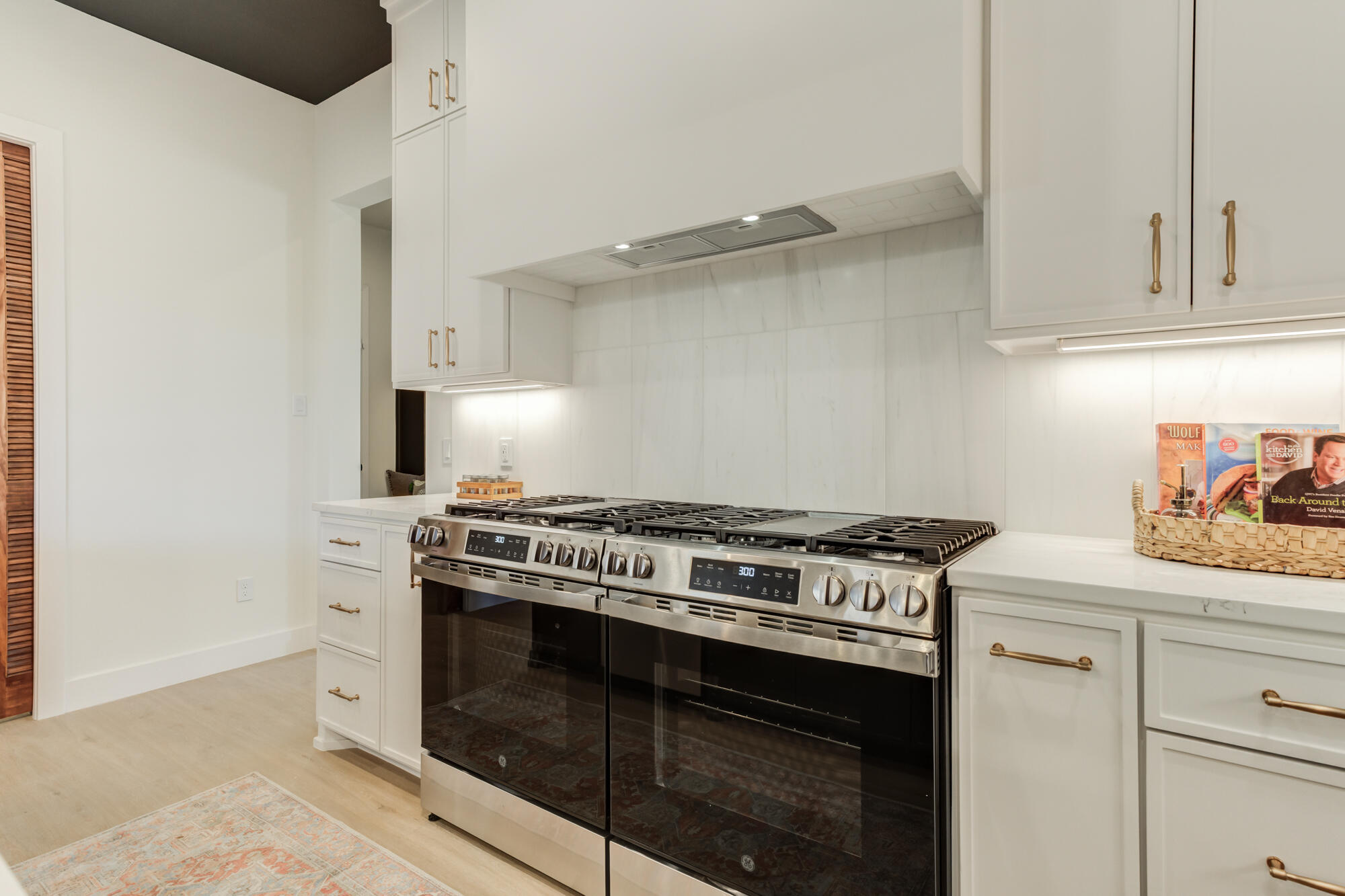 3606 144th Street Lubbock, TX 79423 - Photo 19 of 67 a stove top oven sitting inside of a kitchen