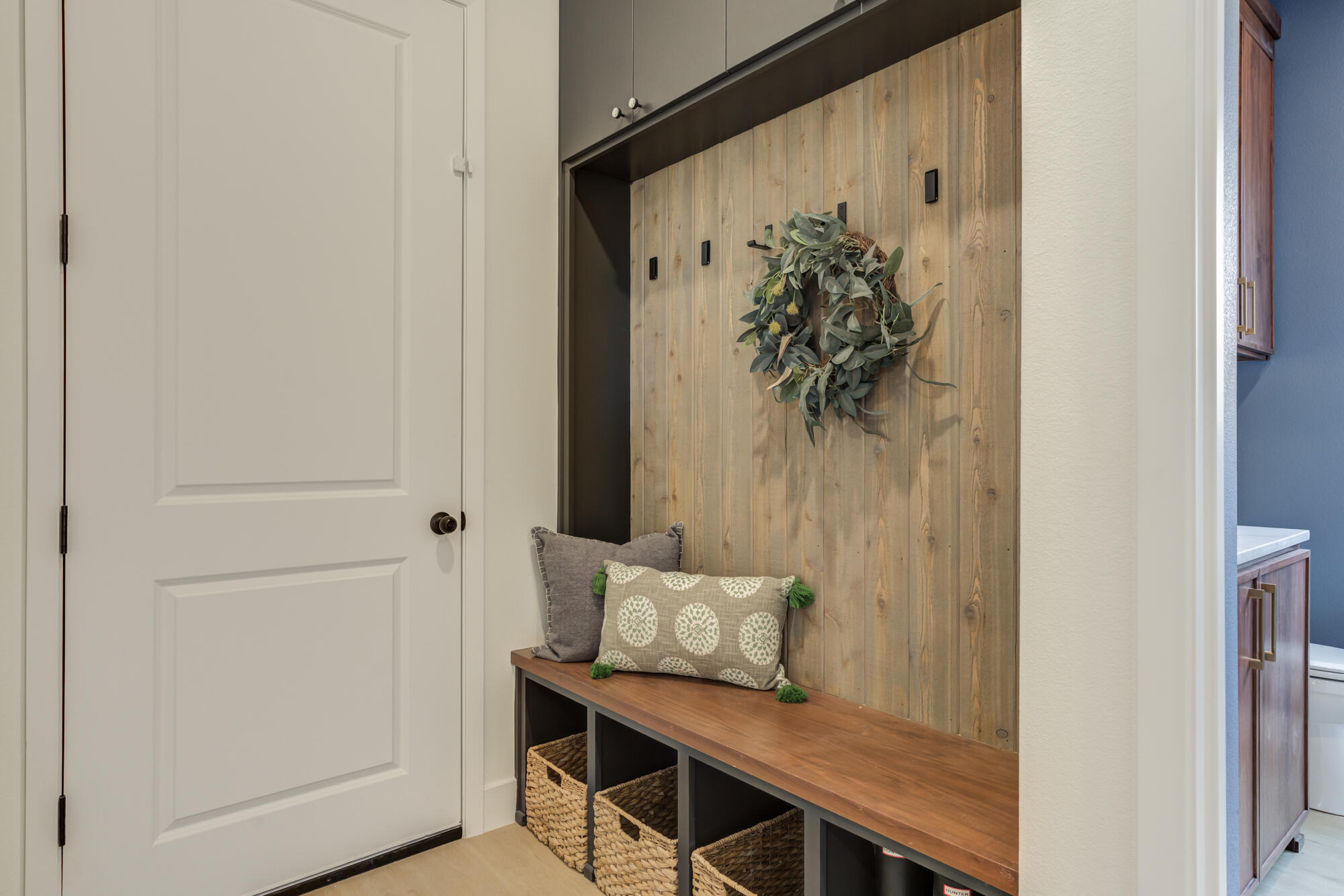 3606 144th Street Lubbock, TX 79423 - Photo 25 of 67 a view of a hallway with wooden floor and a potted plant
