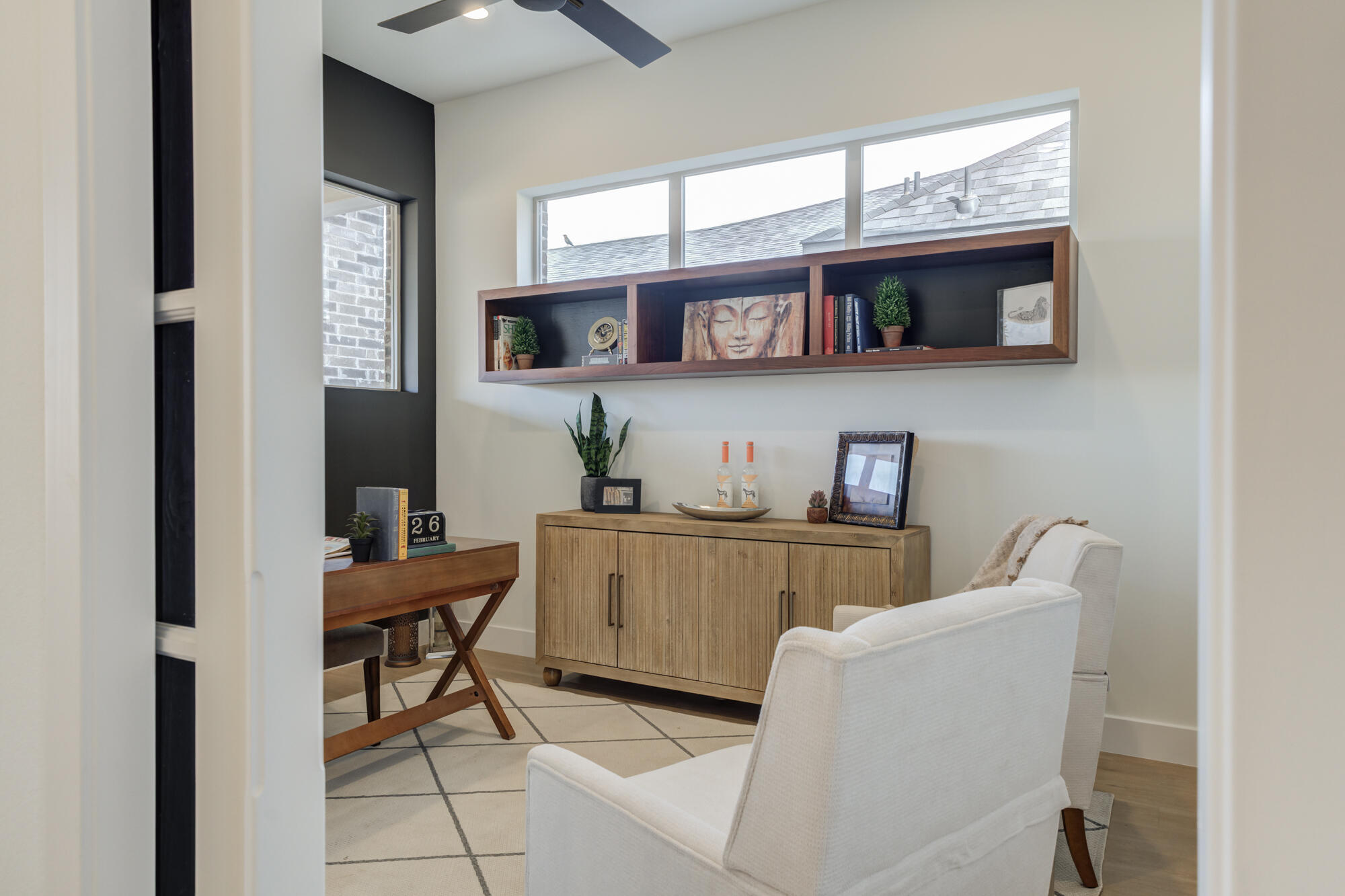 3606 144th Street Lubbock, TX 79423 - Photo 29 of 67 a living room with furniture and a flat screen tv