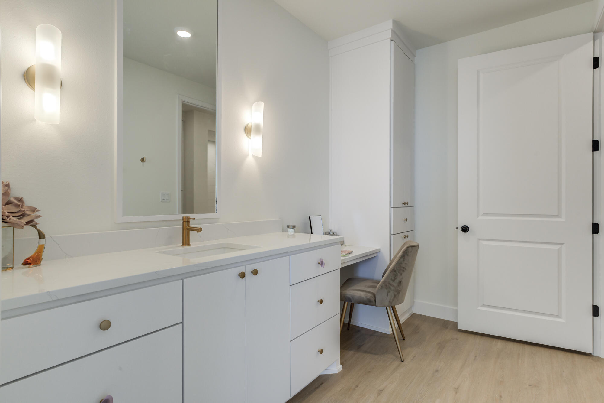 3606 144th Street Lubbock, TX 79423 - Photo 49 of 67 a spacious bathroom with a granite countertop sink and a mirror