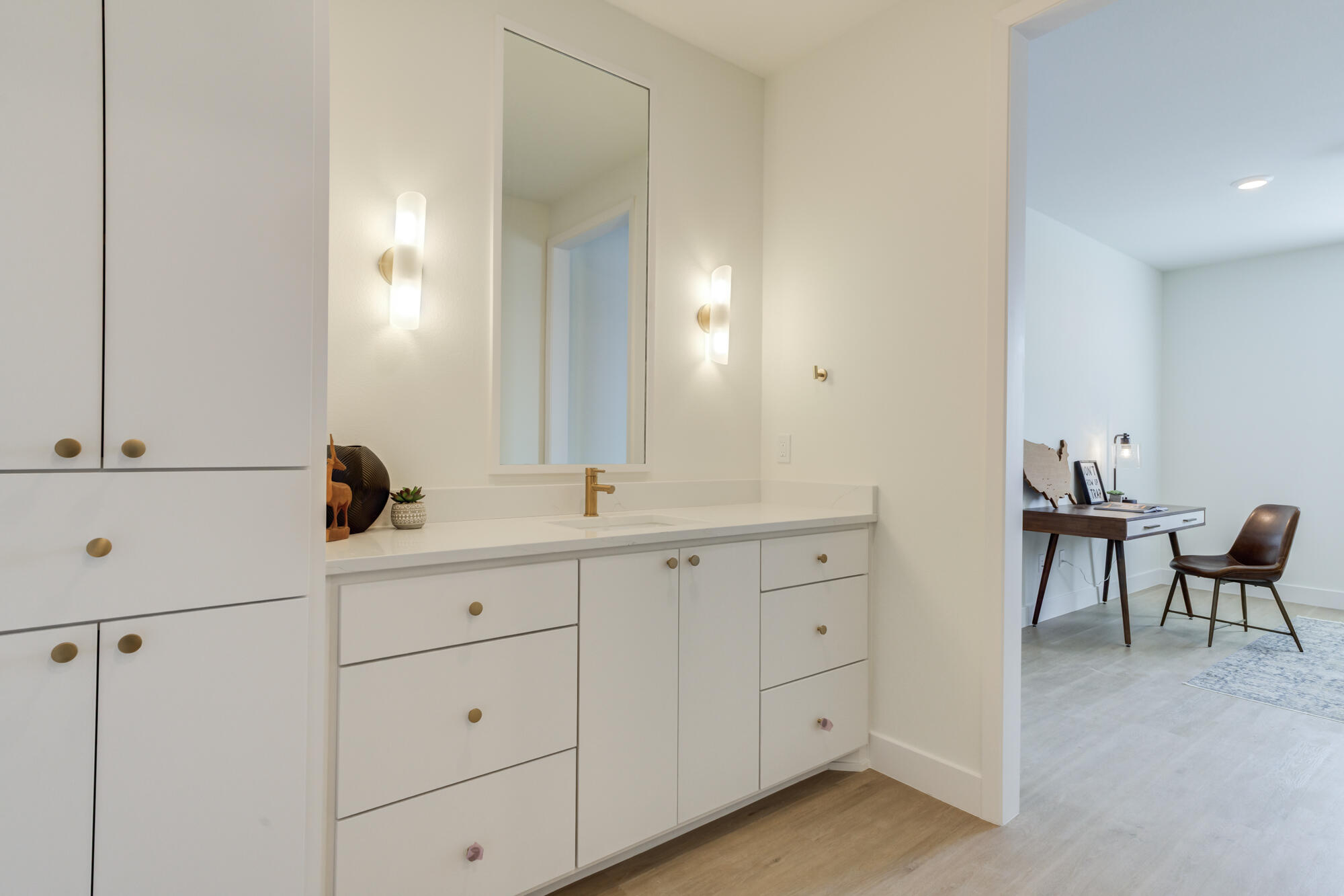 3606 144th Street Lubbock, TX 79423 - Photo 52 of 67 a spacious bathroom with 2 sink and a mirror
