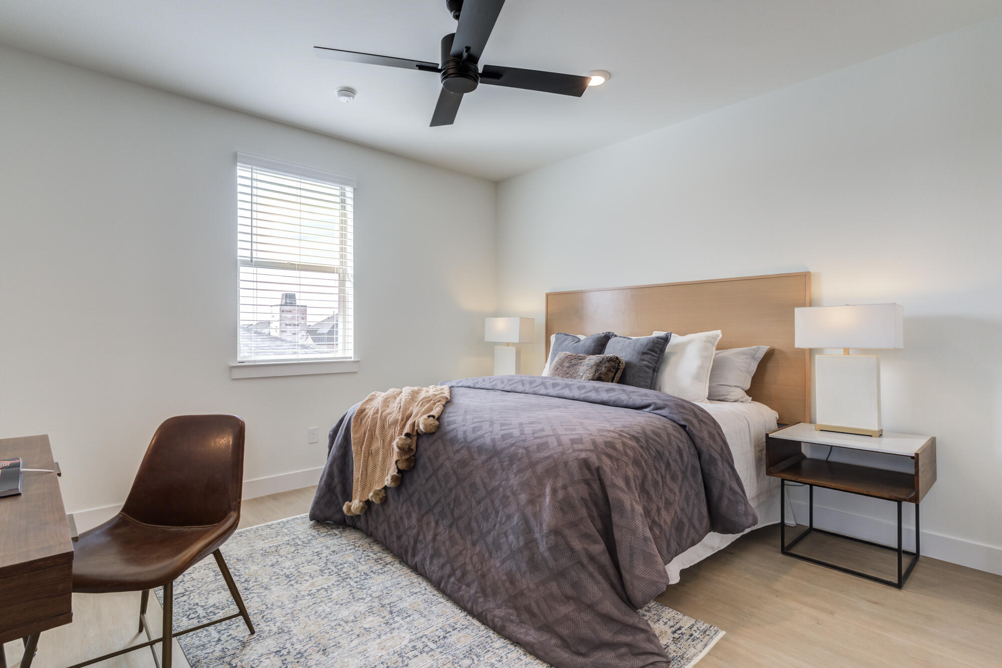 3606 144th Street Lubbock, TX 79423 - Photo 54 of 67 a bed sitting in a bedroom next to a window