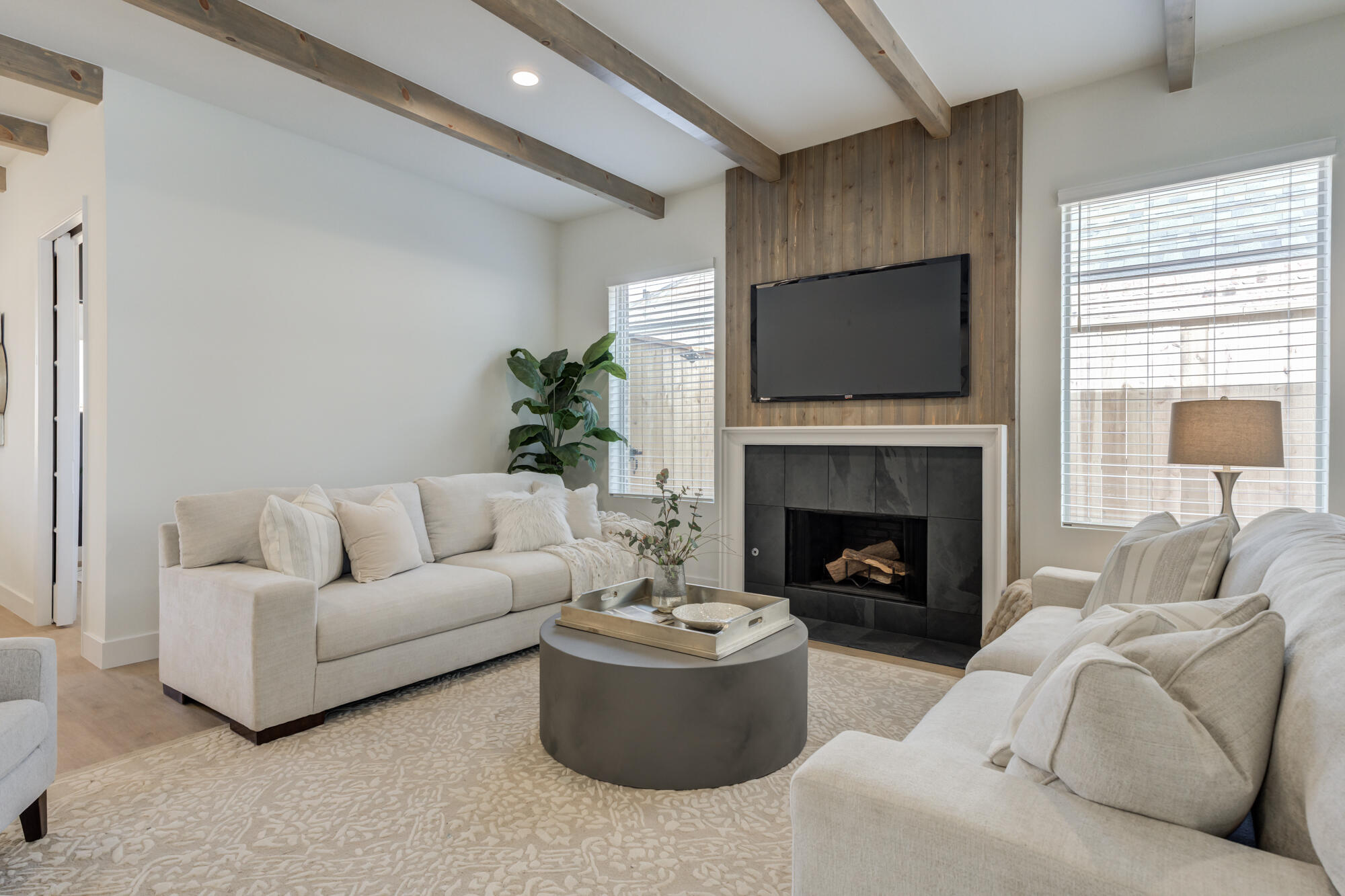 3606 144th Street Lubbock, TX 79423 - Photo 6 of 67 a living room with furniture and a fireplace