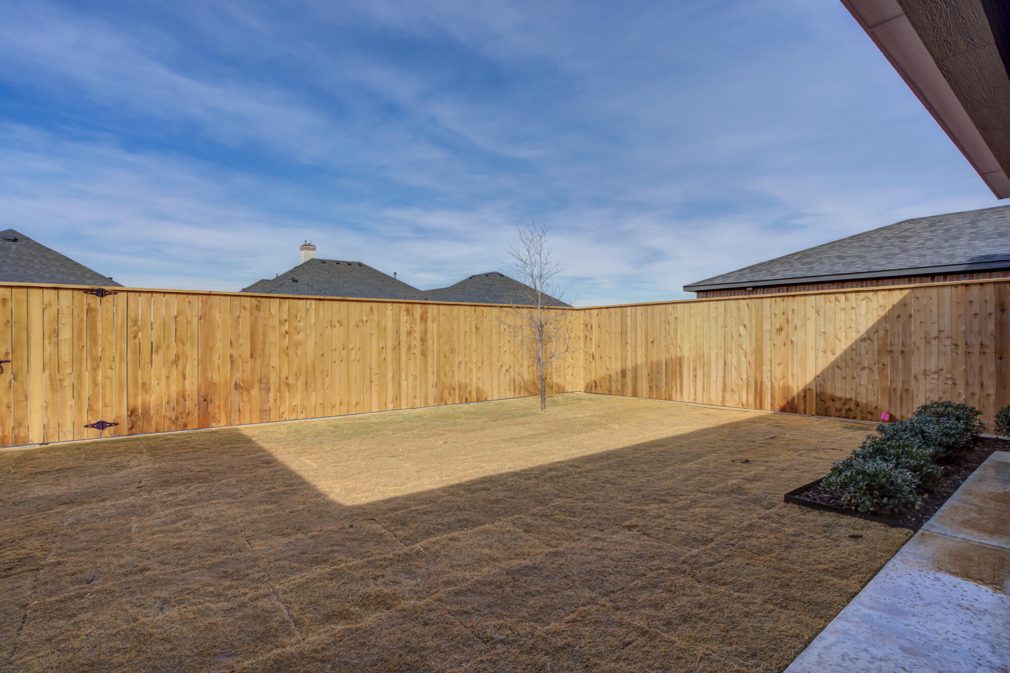 3606 144th Street Lubbock, TX 79423 - Photo 64 of 67 a view of an empty room with a window and a ceiling fan