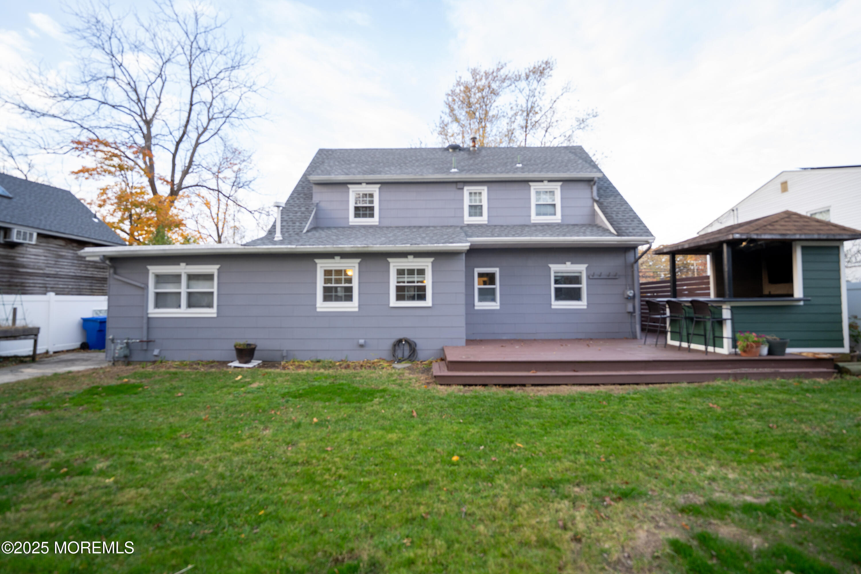 813 Raleigh Drive Toms River, NJ 08753 - Photo 21 of 28 front view of a brick house with a yard