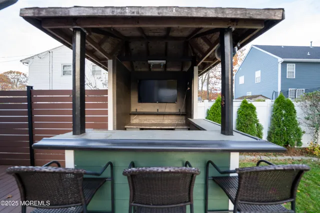 a view of a patio in backyard