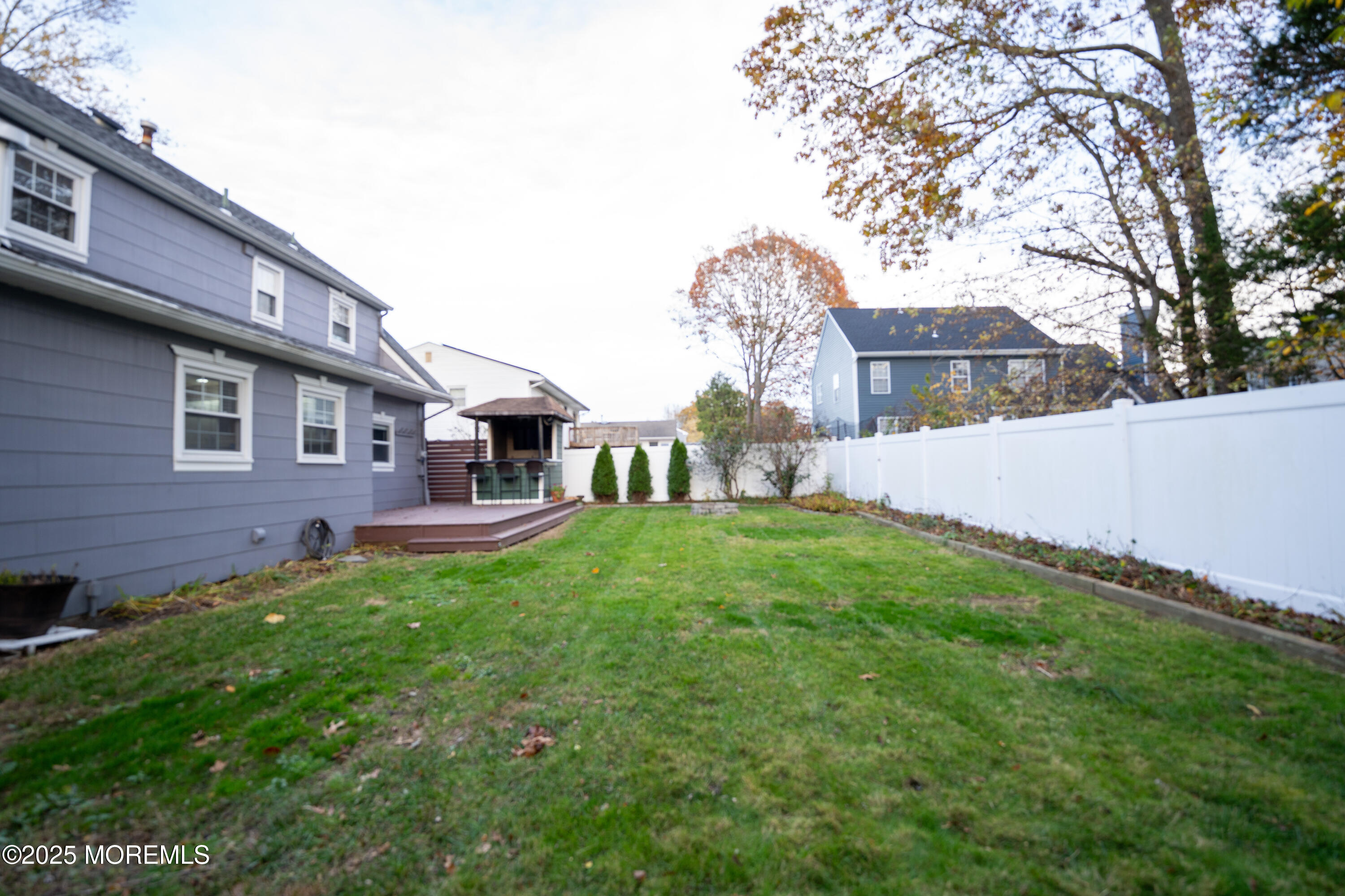813 Raleigh Drive Toms River, NJ 08753 - Photo 23 of 28 a view of backyard of house with green space