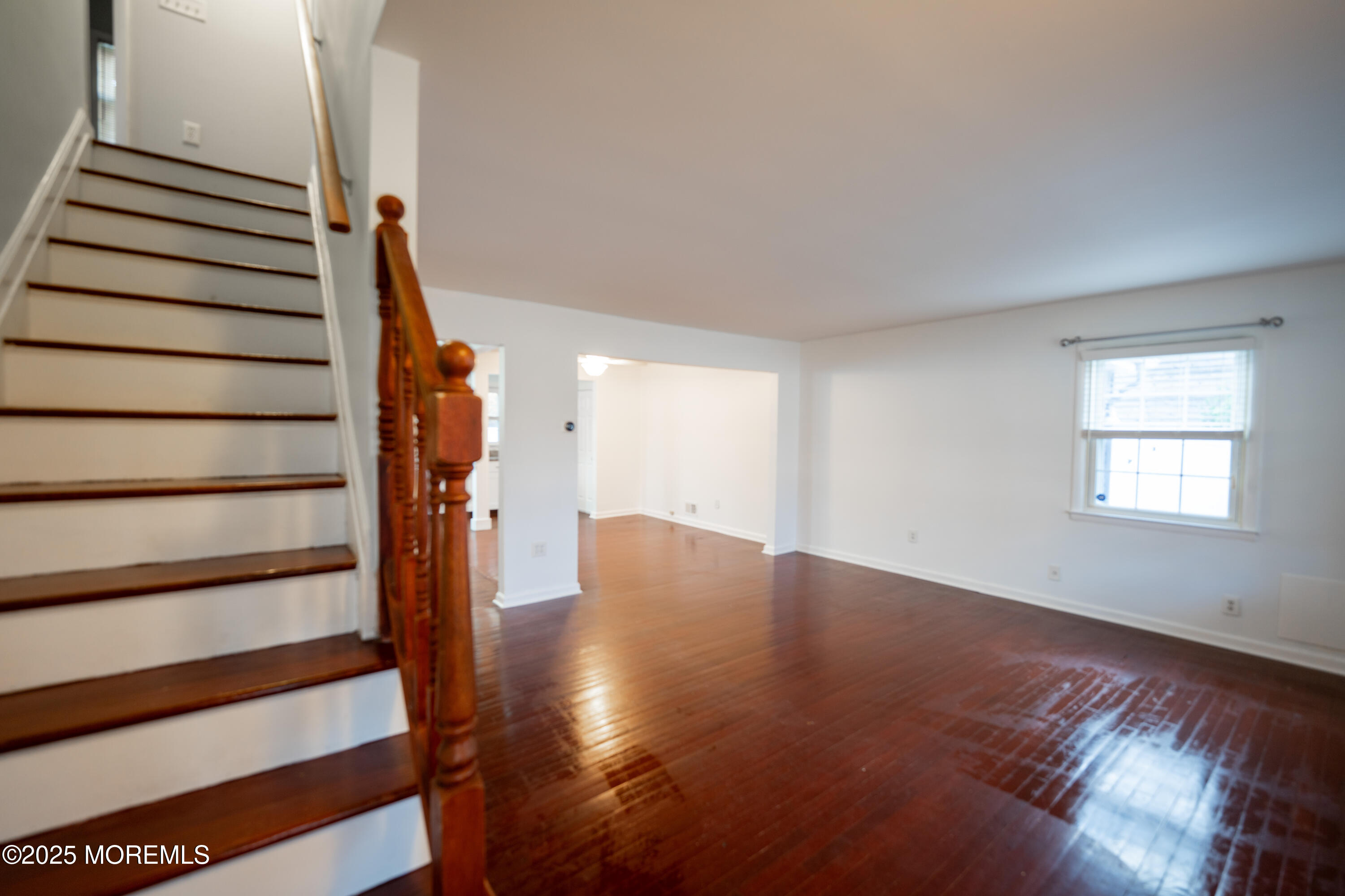 813 Raleigh Drive Toms River, NJ 08753 - Photo 3 of 28 a view of entryway and hall with wooden floor