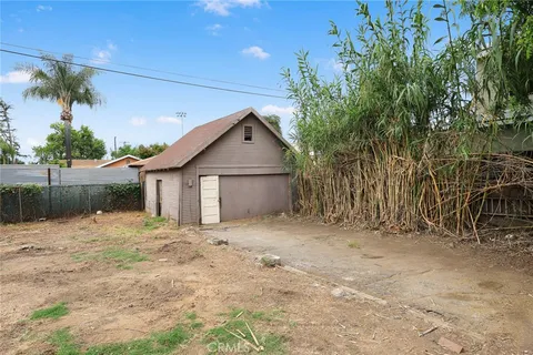 a view of a yard with an outdoor space