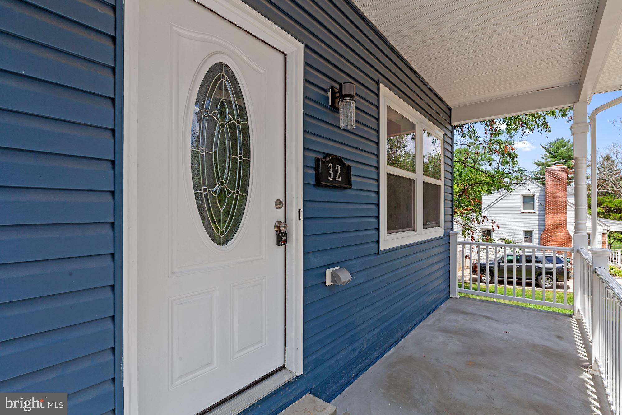 32 Kingsley Road Owings Mills, MD 21117 - Photo 2 of 29 Front porch with decorative door