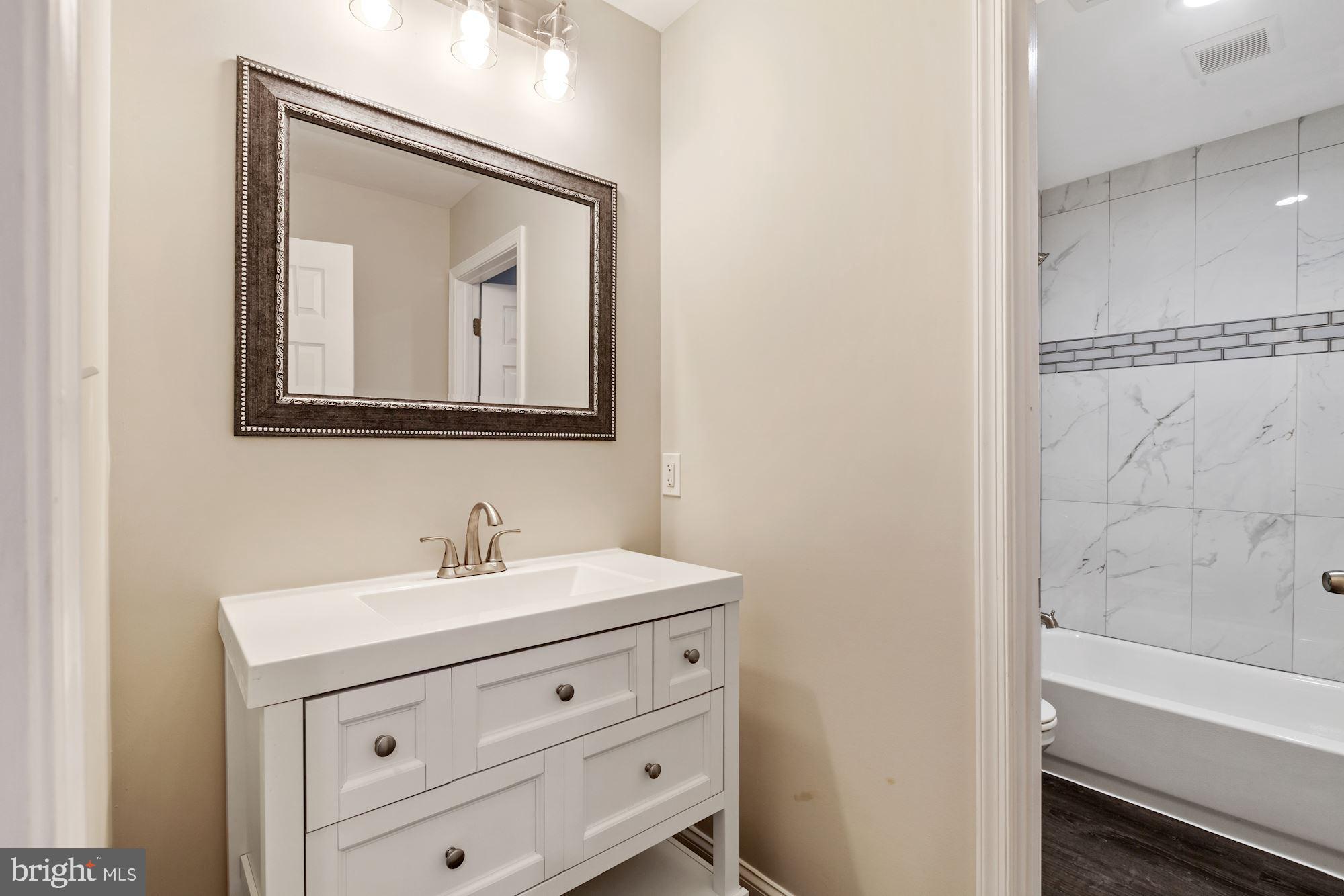 32 Kingsley Road Owings Mills, MD 21117 - Photo 20 of 29 Hallway Bathroom