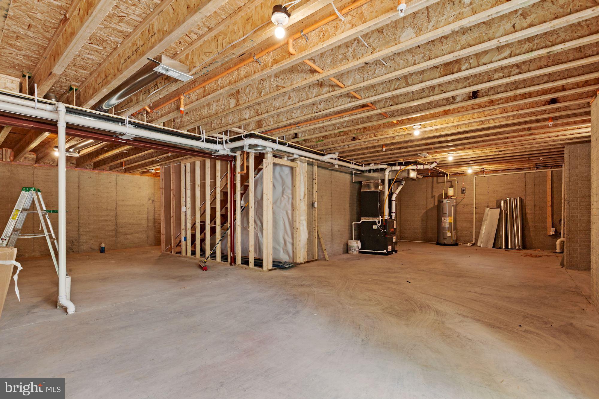 32 Kingsley Road Owings Mills, MD 21117 - Photo 27 of 29 Unfinished Lower Level with Bathroom Rough-in