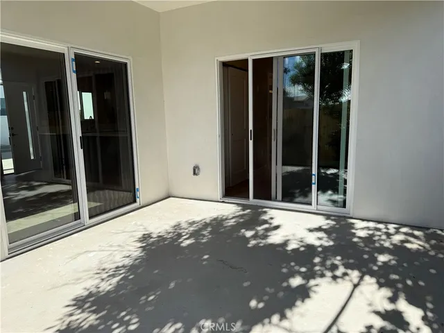 a view of a door in front of a house
