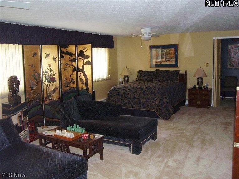 What a beautiful 15 x 26 master bedroom with lots of storage and a picturesque view of the country side!